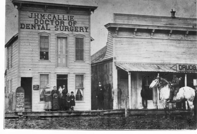 McCallie's Dental Office and White Drug Store 1883